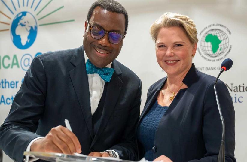 Le président de la BAD , Akinwumi Adesina (à gauche), en compagnie de la ministre norvégienne du Développement international, Anne Beathe, Tvinnereim.