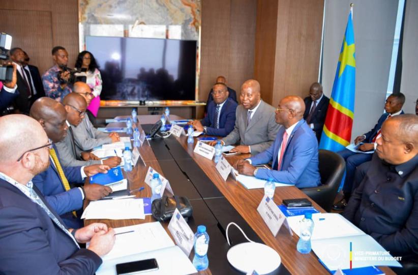 Adolph Muzito avec les partenaires techniques et financiers 
